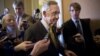 Senate Majority Leader Harry Reid, D-Nev., walks to a closed-door meeting with fellow Democrats as he and Senate Minority Leader Mitch McConnell, R-Ky., work to negotiate a legislative path to avoid the so-called "fiscal cliff," at the Capitol in Washingt