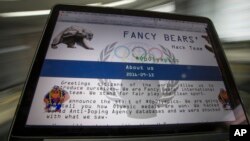 Message des hackers de Fancy Bears sur un écran d'ordinateur à Moscou, le 24 septembre 2016 (AP / Alexander Zemlianichenko)