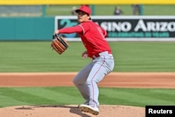 Los Angeles Angels starting pitcher Shohei Ohtani (17) throws in the first inning against the Oakland Athletics during a Spring Training game at Hohokam Stadium, Mesa, Arizona, Feb. 28, 2023. Matt Kartozian-USA TODAY Sports