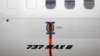 FILE - A seal is seen on Garuda Indonesia's Boeing 737 MAX 8 airplane parked at Soekarno-Hatta International airport near Jakarta, Indonesia, March 13, 2019. 