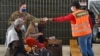 US Suspends Afghan Evacuee Flights Into US Because of Measles