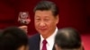 FILE - Chinese President Xi Jinping toasts during a reception at the Great Hall of the People on the eve of the Oct. 1 National Day holiday in Beijing.
