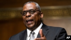 Secretary of Defense nominee Lloyd Austin, a recently retired Army general, speaks during his conformation hearing before the Senate Armed Services Committee on Capitol Hill, Jan. 19, 2021, in Washington.