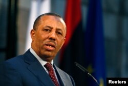 Libya's Prime Minister Abdullah al-Thinni takes part in a news conference in Valletta, Malta, Oct. 21, 2014