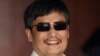 Blind Chinese legal activist Chen Guangcheng arrives at Washington Square Village on the campus of New York University, May 19, 2012, in New York.