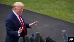 FILE - President Donald Trump speaks with reporters before departing on Marine One from the South Lawn of the White House, in Washington, Sept. 9, 2019.