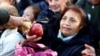 Long Lines Form for Free Fruit in Buenos Aires
