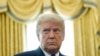 FILE - A Dec. 7, 2020, photo of President Donald Trump in the Oval Office of the White House in Washington. 