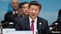 លោក ស៊ី ជិនពីង (Xi Jinping) ជា​ប្រធានាធិបតី​ប្រទេស​ចិន។