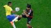 Brazil's Luiz Gustavo (l) and Germany's Sami Khedira, go for the ball during the World Cup semifinal soccer match between Brazil and Germany at the Mineirao Stadium in Belo Horizonte, Brazil, July 8, 2014. 