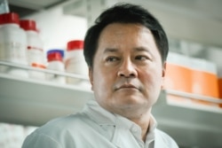 This picture taken on May 14, 2020 shows Sunney Xie, director of Peking University's Beijing Advanced Innovation Center for Genomics, during an interview at his laboratory in Beijing.