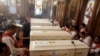 Les cercueils des chrétiens coptes assassinés lors de leurs funérailles à l'église du Grand Prince Marty Tadros, à Minya, en Égypte, le 3 novembre 2018.