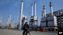 FILE - Tehran oil refinery, Dec. 22, 2014. 