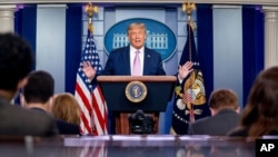 President Donald Trump speaks at a news conference in the James Brady Press Briefing Room at the White House, Tuesday, Aug. 11, 2020, in Washington. (AP Photo/Andrew Harnik)