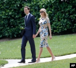White House senior adviser Jared Kushner and his wife Ivanka Trump, daughter and assistant to President Donald Trump, walk out to join President Trump aboard Marine One helicopter, May 19, 2017.
