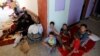 Civilians who fled their homes due to the clashes on the outskirts of Falluja, gather in the town of Garma, Iraq, May 30, 2016. 