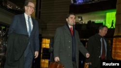 Under Secretary for International Affairs David Malpass of the U.S. Department of the Treasury and other members of the U.S. trade delegation to China, return from talks to a hotel in Beijing, Jan. 7, 2019.
