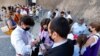 Tourists have their Green Pass checked by keepers at the entrance of the Vatican Museums, Aug. 6, 2021. 