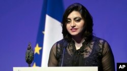 Pakistani authorities detained and then released on bail Gulalai Ismail, a prominent human rights activist, as she re-entered the country, although they withheld her passport, the activist said.