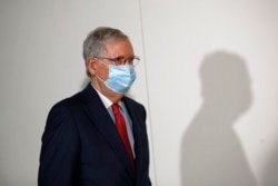 FILE - Senate Majority Leader Mitch McConnell of Kentucky attends a press conference on Capitol Hill in Washington, May 19, 2020.