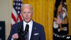 President Joe Biden participates in a virtual event with the Munich Security Conference, in the East Room of the White House, in Washington, Feb. 19, 2021. 