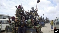 Al-Shabab fighters conduct military exercises in northern Mogadishu, Somalia, October 21, 2010.
