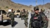 Pasukan khusus Afghanistan berjaga-jaga di lokasi ledakan bom mobil bunuh diri yang menewaskan setidaknya empat orang, di pinggiran Kabul, Afghanistan, Kamis, 12 September 2019. (Foto: AP)