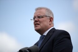 FILE - Australian Prime Minister Scott Morrison speaks during a press conference in Sydney, Feb. 28, 2020.