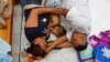 Caravan Migrants Hop Freight Train in Mexico Heading North