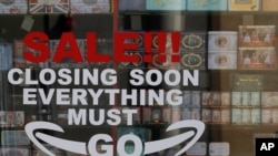 A closing down sign on a shop front in London, as the country is in lockdown to help curb the spread of the coronavirus, April 15, 2020.
