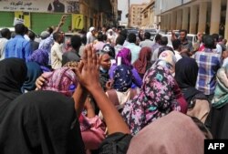 Sudanese protesters take part in an anti-government demonstration in Khartoum, Feb. 14, 2019. Deadly protests that erupted in Sudan Dec. 19 over the tripling of the price of bread have spread across the country and escalated into calls for President Omar al-Bashir to step down.