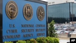 FILE - A sign identifying the National Security Agency's (NSA) headquarters is seen in Fort Meade, Maryland, outside of Washington, D.C.