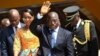 FILE - Congolese President Joseph Kabila, center, waves as he and others celebrate independence for the Democratic Republic of Congo in Kindu, Congo. 