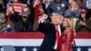 President Donald Trump and first lady Melania Trump prepare to leave a rally for U.S. Senators Kelly Loeffler, R-Ga., and David Perdue, R-Ga., who are both facing runoff elections Dec. 5, 2020, in Valdosta, Ga. 