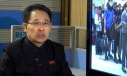 In this image made from video, North Korea's Ministry of Health Director Kim Dong Gun talks about the country's efforts to contain the spread of the new coronavirus, at the Ministry of Health, Jan. 30, 2020, in Pyongyang, North Korea.