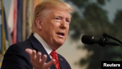 Presiden AS Donald Trump membuat pernyataan di Gedung Putih, 27 Oktober 2019. Pernyataan itu dibuat menyusul adanya laporan pasukan AS menyerang pemimpin ISIS, Abu Bakar al-Baghdadi, di Suriah Utara. (Foto: Reuters)