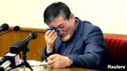 A man who identified himself as Kim Dong Chul, who previously said he was a naturalised American citizen and was arrested in North Korea in October, attends a news conference in Pyongyang, North Korea, in this undated photo released by North Korea's Korean Central News Agency (KCNA) in Pyongyang, March 25, 2016.