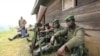Waasi wa M23 wakipumzika, Karambi, mashariki mwa DRC,kivu kaskazini karibu na mpaka na Uganda, July 12, 2012. 