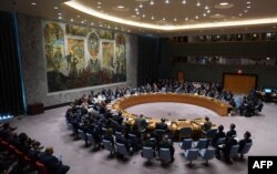 FILE - Members of the U.N. Security Council gather for a meeting on North Korea, Sept. 27, 2018, at the United Nations in New York.