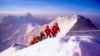 Yuichiro Miura on his way to the summit of Mount Everest, along the Nepal-Tibet border, May 2003 (Courtesy of Miura Dolphins).