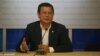 FILE - El Salvadoran Foreign Minister Hugo Martinez, shown at a June news conference in San Salvador, is part of a delegation lobbying U.S. lawmakers to extend two programs shielding its nationals from deportation.