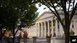 FILE - The U.S. Treasury Building in Washington, Oct. 16, 2013.