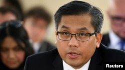 FILE - Myanmar's United Nations Ambassador Kyaw Moe Tun addresses the U.N. Human Rights Council in Geneva, Switzerland, March 11, 2019. 