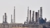 FILE - This file photo taken on Sept. 15, 2019, shows an Aramco oil facility near al-Khurj area, just south of the Saudi capital, Riyadh.