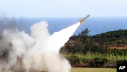 FILE - A HAWK surface-to-air missile is test-fired from Jeoupeng military base in Taiwan, Jan. 18, 2011. The United States is set to send more ammunition to Ukraine, including more missiles for Ukraine's HAWK air defense systems, the Pentagon announced July 3, 2024.