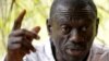 Opposition leader Kizza Besigye speaks during a news conference at his home at the outskirts of Kampala, Uganda, Feb. 21, 2016.
