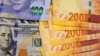 Le Zimbabwe va imprimer des billets indexés sur le cours du dollar américain