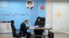 Ish presidenti  iranian Mahmud Ahmadinexhad duke u regjistruar për të garuar në zgjedhjet presidenciale të 28 qershorit.
