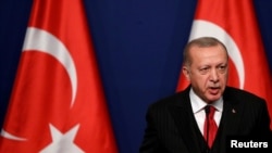 Turkish President Recep Tayyip Erdogan attends a news conference with Hungarian Prime Minister Viktor Orban in Budapest, Hungary, Nov. 7, 2019. 