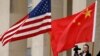FILE - U.S. and Chinese flags fly at the Pentagon in Arlington, Virginia, November 9, 2018.